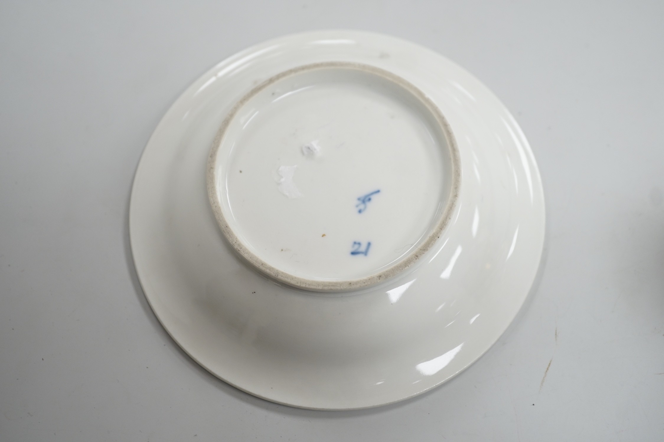 An early 19th century Furstenburg brown and white cup and saucer, saucer diameter 13cm